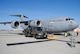 Airmen and Air Force civilian contractors from Grand Forks Air Force Base, N.D., refuel a Boeing C-17 Globemaster III assigned to the 176th Wing, a unit of the Alaska Air National Guard, at Joint Base Elmendorf-Richardson on the base flightline Sept. 16, 2014.  The C-17 transported more than two dozen Marines from Afghanistan to South Carolina.  The return flight of this C-17 was seen as a joint endeavor between Airmen from the Alaska Air National Guard and active-duty Airmen from Grand Forks AFB designed to help Marines from Marine Fighter Attack Squadron 122 to get home after concluding operations in Afghanistan. (U.S. Air Force photo/Staff Sgt. Luis Loza Gutierrez) 