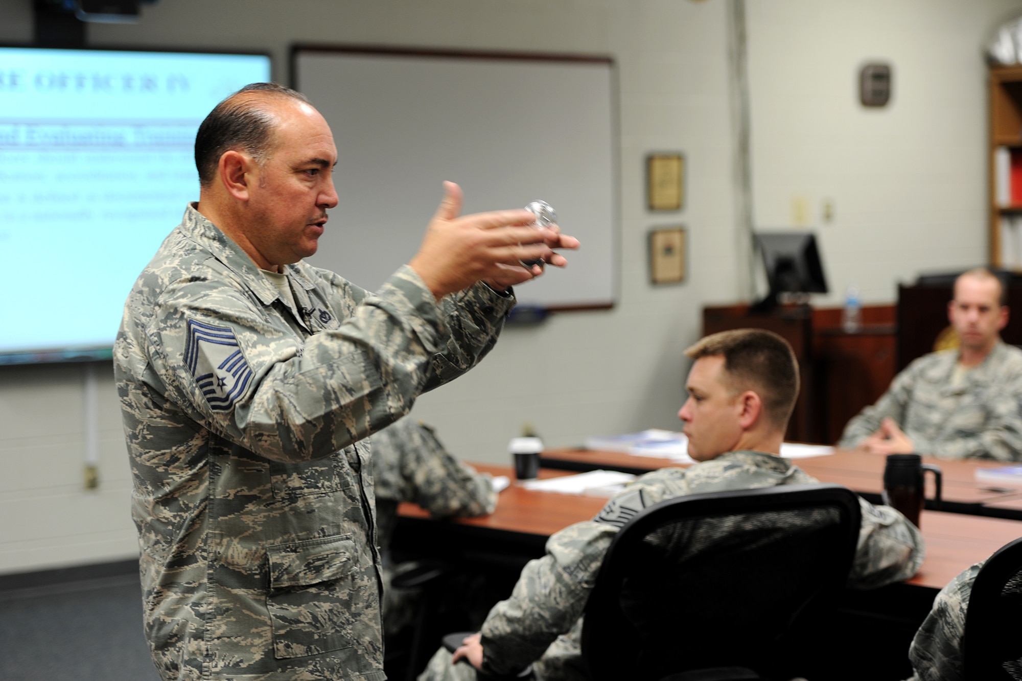 GOODFELLOW AIR FORCE BASE, Texas -- Chief Master Sgt. Jesus Longoria Jr., 312th Training Squadron instructor, gives a lecture during the Fire Officer IV Course at the Louis F. Garland Department of Defense Fire Academy Sept. 19. Longoria explained how chief officers must ensure the existence of adequate education and in-service training programs. In-service training programs are an ongoing process to ensure firefighters maintain the skills needed to perform operations. (U.S. Air Force photo/ Airman 1st Class Devin Boyer)