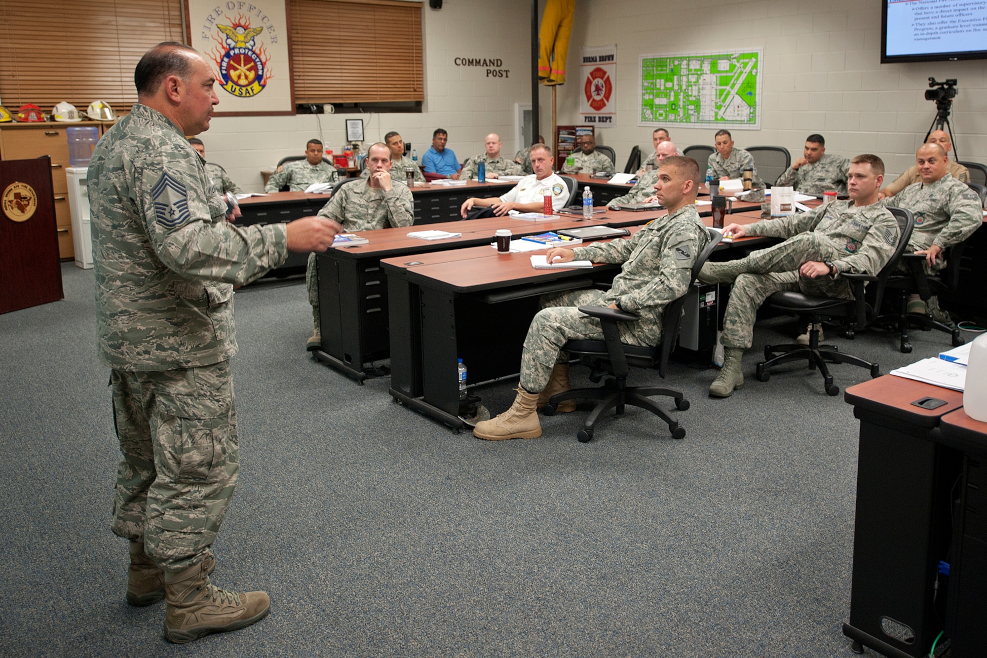 GOODFELLOW AIR FORCE BASE, Texas – Chief Master Sgt. Jesus Longoria Jr., 312th Training Squadron instructor, gives a lecture during the Fire Officer IV Course at the Louis F. Garland Department of Defense Fire Academy Sept. 19. Fire Officer IV is the capstone certification in the process of becoming a qualified fire chief. (U.S. Air Force photo/ Airman 1st Class Devin Boyer)