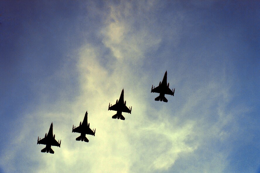 Four U.S. Air Force F-16CM Fighting Falcons assigned to the 20th Fighter Wing fly over Shaw Air Force Base, S.C. as they make their final approach to land, Sept. 18, 2014. The 20th FW’s fighter jets are maintained by dedicated crew chiefs who are assigned to the 20th Aircraft Maintenance Squadron. They are responsible for keeping the multi-million dollar fighting falcon mechanically sound and combat ready. (U.S. Air Force photo by Staff Sgt. Kenny Holston/Released)