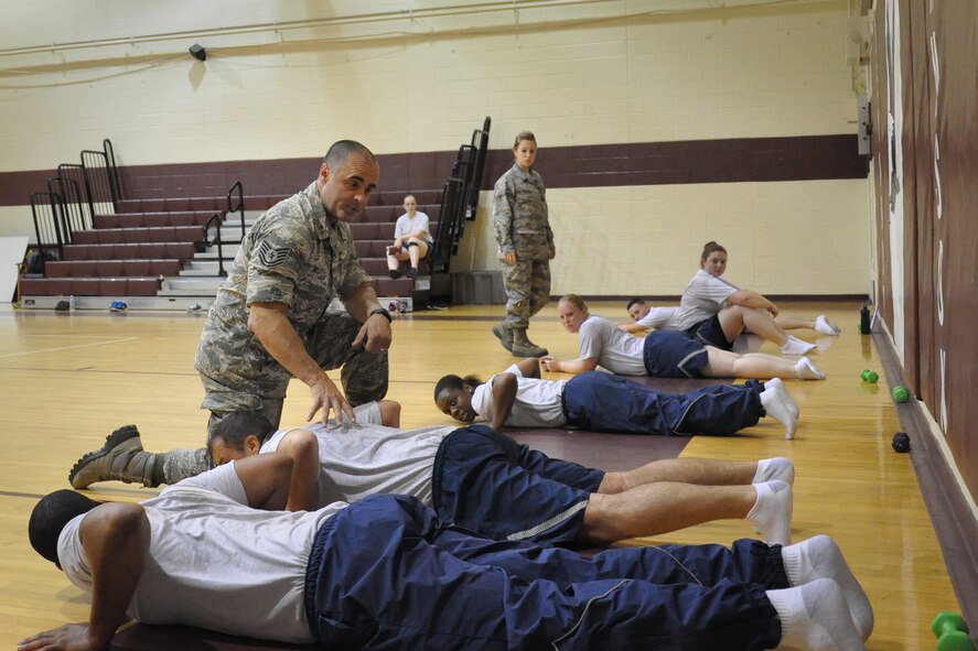 Tech. Sgt. Tim Kelly and Airman 1st Class Rachel Patterson, 916th Force Support Squadron services specialists, provide physical training assistance to 916th Air Refueling Wing Airmen, Seymour Johnson Air Force Base, North Carolina. In addition to their military service, Kelly and Patterson are accredited, certified personal trainers and work full-time in the fitness industry. (Staff Sgt. Alan Abernethy) 