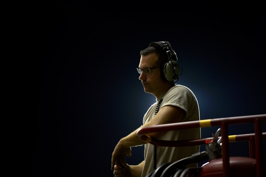 U.S. Air Force Staff Sgt. Stephen Leonardi, 20th Aircraft Maintenance Squadron dedicated crew chief, pauses after helping perform maintenance on an F-16CM Fighting Falcon at Shaw Air Force Base, S.C., Sept. 18, 2014. Crew chiefs are responsible for keeping the multi-million dollar fighting falcon mechanically sound and combat ready. (U.S. Air Force photo by Staff Sgt. Kenny Holston/Released)