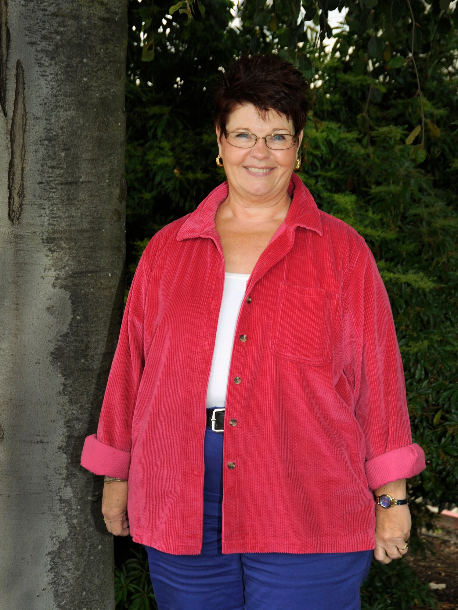 Mary Bell, Family Programs Director stands outside the 142nd Fighter Wing Headquarters Build, Portland Air National Guard Base, Ore., Sept. 23, 2014. Bell has been associated with the Portland Air Base in some capacity for nearly 54 years since her father was assigned to the base as an active duty Airman in 1961. (U.S. Air National Guard photo by Tech. Sgt. John Hughel, 142nd Fighter Wing Public Affairs/Released)