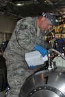 MOUNTAIN HOME AIR FORCE BASE, Idaho – Air Force Reserve Tech. Sgt.  David Robitaille, an aerial spray maintainer assigned to the 910th Maintenance Squadron, pours an anti-drift material into one of the tanks of the Modular Aerial Spray System (MASS) onboard a C-130 Hercules aircraft prior to its take off here, Sept. 18, 2014.  The aircraft performed a series of aerial spray sorties over the nearby Saylor Creek Bombing Range. The 910th Airlift Wing, based at Youngstown Air Reserve Station, Ohio, is home to the Department of Defense’s only large-area, fixed-wing aerial spray capability, conducted a mission to spray herbicide on invasive cheat grass as a means of fire prevention here, Sept. 15-26, 2014. U.S. Air Force photo by Master Sgt. Bob Barko Jr.