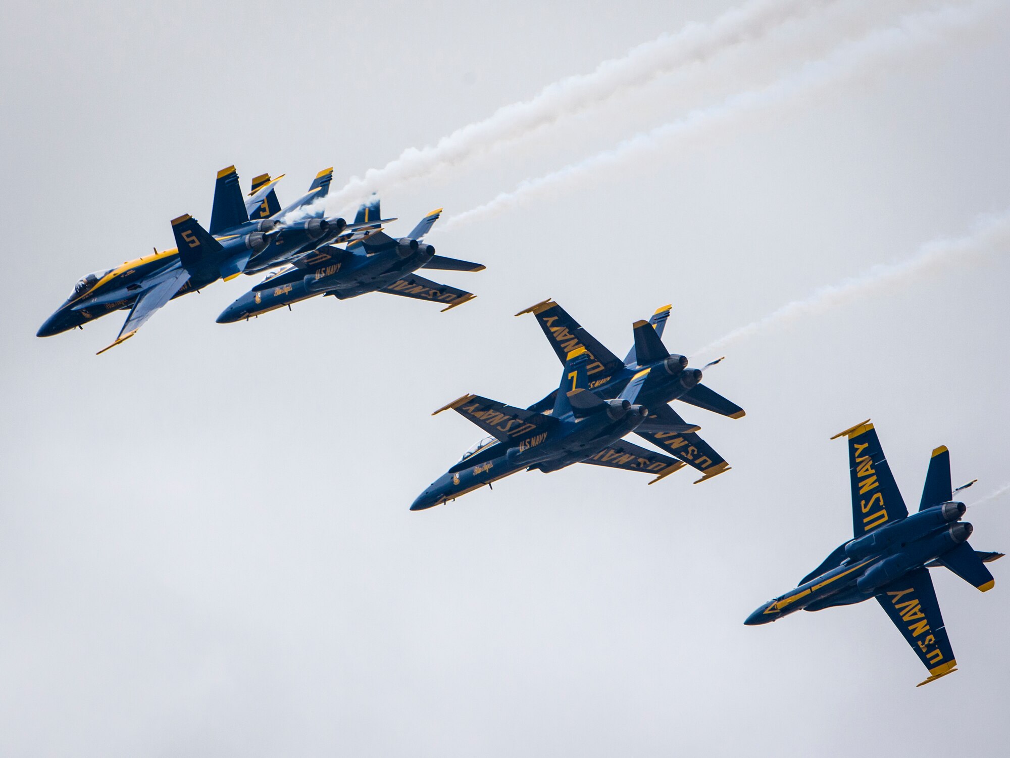 The Blue Angels practice aerial maneuvers in preparation for the Wings over the Pacific Air Show at Joint Base Pearl Harbor-Hickam, Hawaii, Sept. 26, 2014. The Blue Angels are the U.S. Navy’s premier aerial demonstration team. (U.S. Air Force photo by Capt. Raymond Geoffroy/Released)