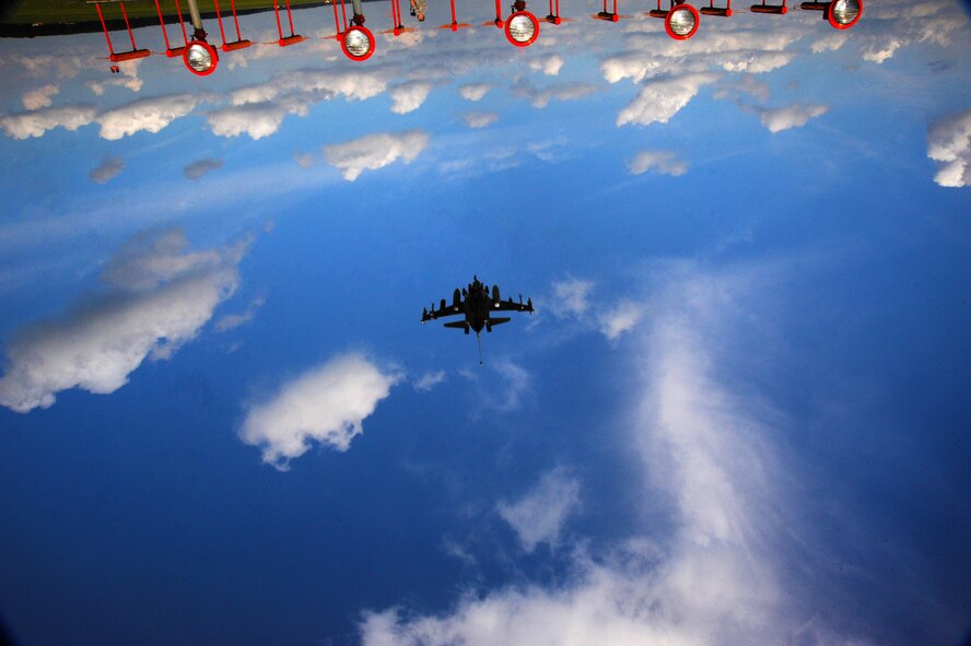 An F-16CM Fighting Falcon approaches the runway at Shaw Air Force Base, S.C., Sept. 18, 2014. F-16s are a compact, multi-role fighter aircraft which are highly maneuverable, giving it the capability to fly inverted. This image was purposely captured upside-down to illustrate the jet’s inverted capabilities. (U.S. Air Force photo by Airman 1st Class Michael Cossaboom/Released)