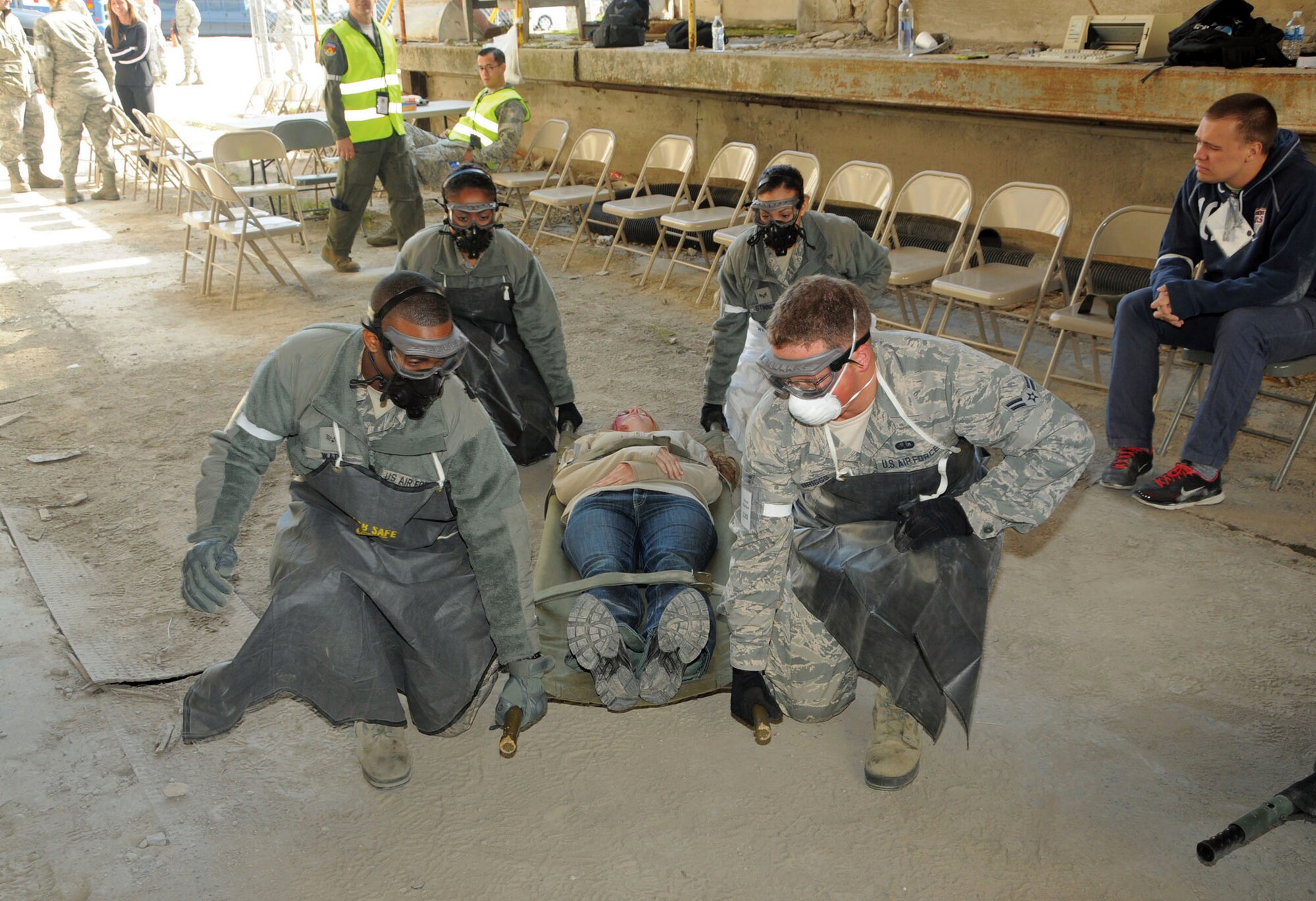 FAIRBORN, Ohio - The 445th Force Support Squadron mortuary affairs team removes a “deceased Airman” from the casualty collection point during the exercise. The team simulated processing the remains at the field morgue and sending to Dover Air Force Base, Delaware for final processing.. (U.S. Air Force photo/Maj. Demetrius Smith)