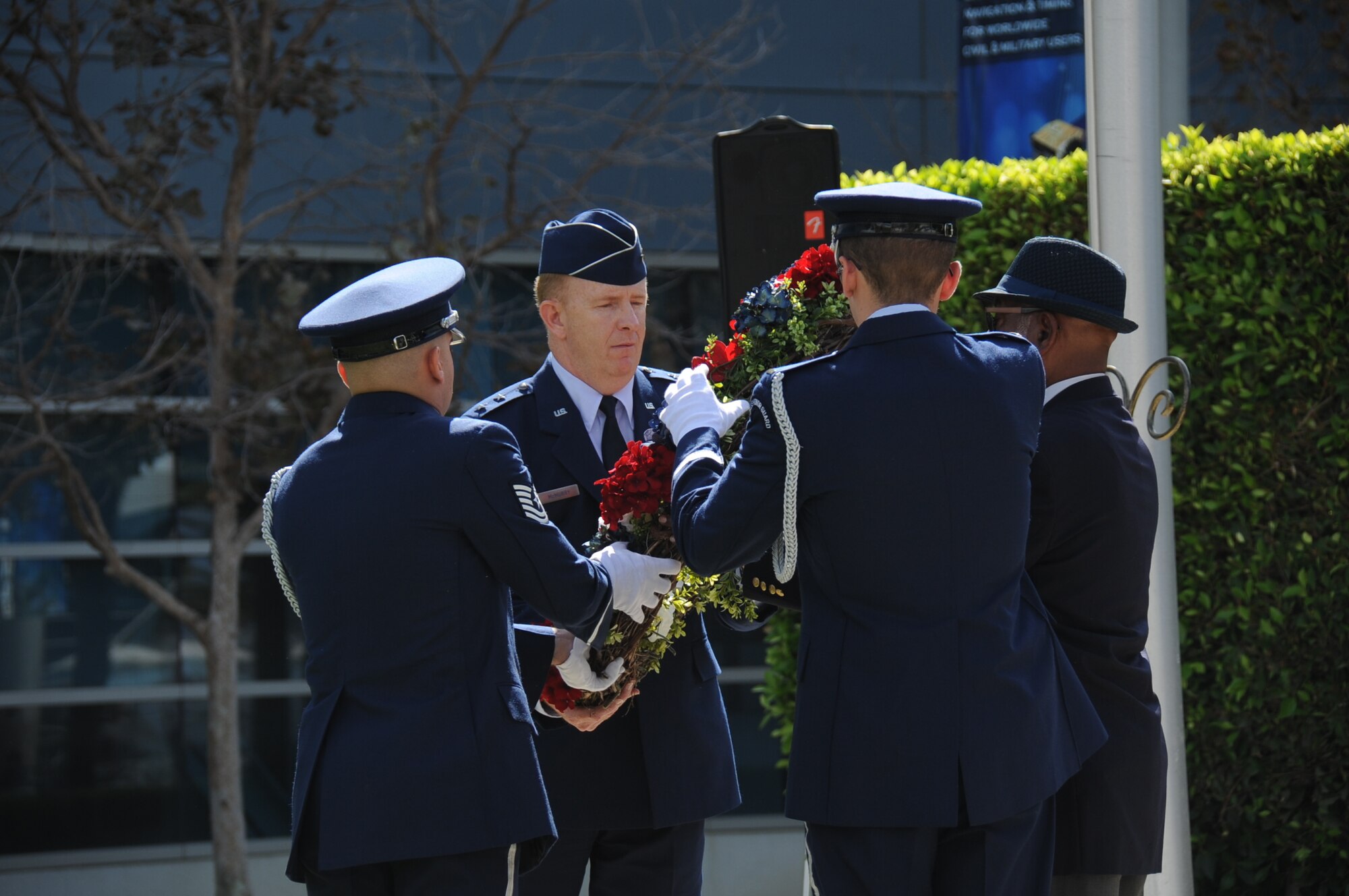 The Space and Missile Systems Center at Los Angeles Air Force Base, Calif., held its annual POW/MIA 24 hour Torch Relay, starting with a ceremony at the San Pedro Coast Guard Station, Sept. 18, 2014, where Coast Guard members ran the first leg, followed by LAAFB, then the Army and Navy from the MEPS Center in El Segundo through the South Bay Beach cities, to bring awareness about America’s POW/MIAs. The torch was carried around LAAFB’s track through the night culminating with a wreath laying ceremony at 9 a.m. on Friday, Sept. 19. (Photos by Joe Juarez, Sarah Corrice and Van Ha)