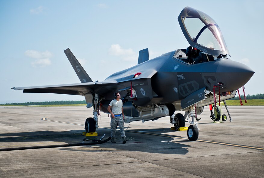 Staff Sgt. Todd Bedo, 33rd Fighter Wing, performs checks on an F-35A Lightning II during refueling after its first landing at Duke Field, Fla.  The aircraft was there participating in a joint multi-wing major accident response exercise.  (U.S. Air Force photo/Tech. Sgt. Sam King)