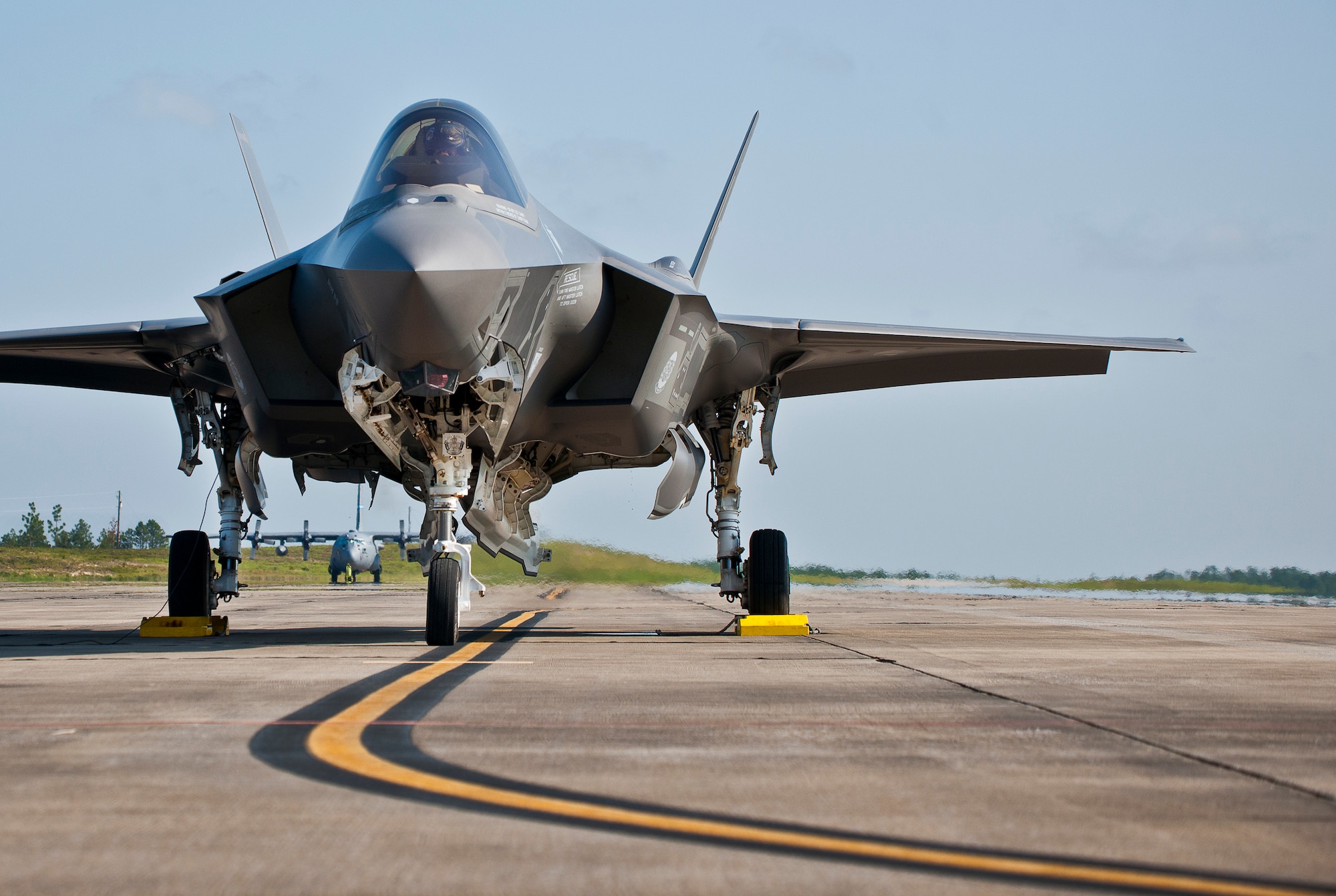 A 33rd Fighter Wing F-35A Lightning II sits on the flightline after its first landing at Duke Field, Fla.  The aircraft was there participating in a joint multi-wing major accident response exercise.  (U.S. Air Force photo/Tech. Sgt. Sam King)