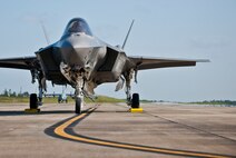 A 33rd Fighter Wing F-35A Lightning II sits on the flightline after its first landing at Duke Field, Fla.  The aircraft was there participating in a joint multi-wing major accident response exercise.  (U.S. Air Force photo/Tech. Sgt. Sam King)
