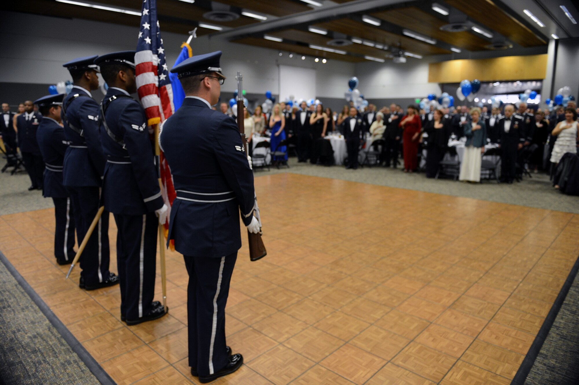 Members of the McChord Field Honor Guard, present the colors Sept. 26, 2014, during the Air Force Ball at Clover Park Technical College, Lakewood, Wash. The theme of the ball was the total force concept, in which military and civilian personnel representing the active duty, Reserve and Air National Guard attended the ball in celebration of the Air Force’s birthday. (U.S. Air Force photo/Airman 1st Class Keoni Chavarria)