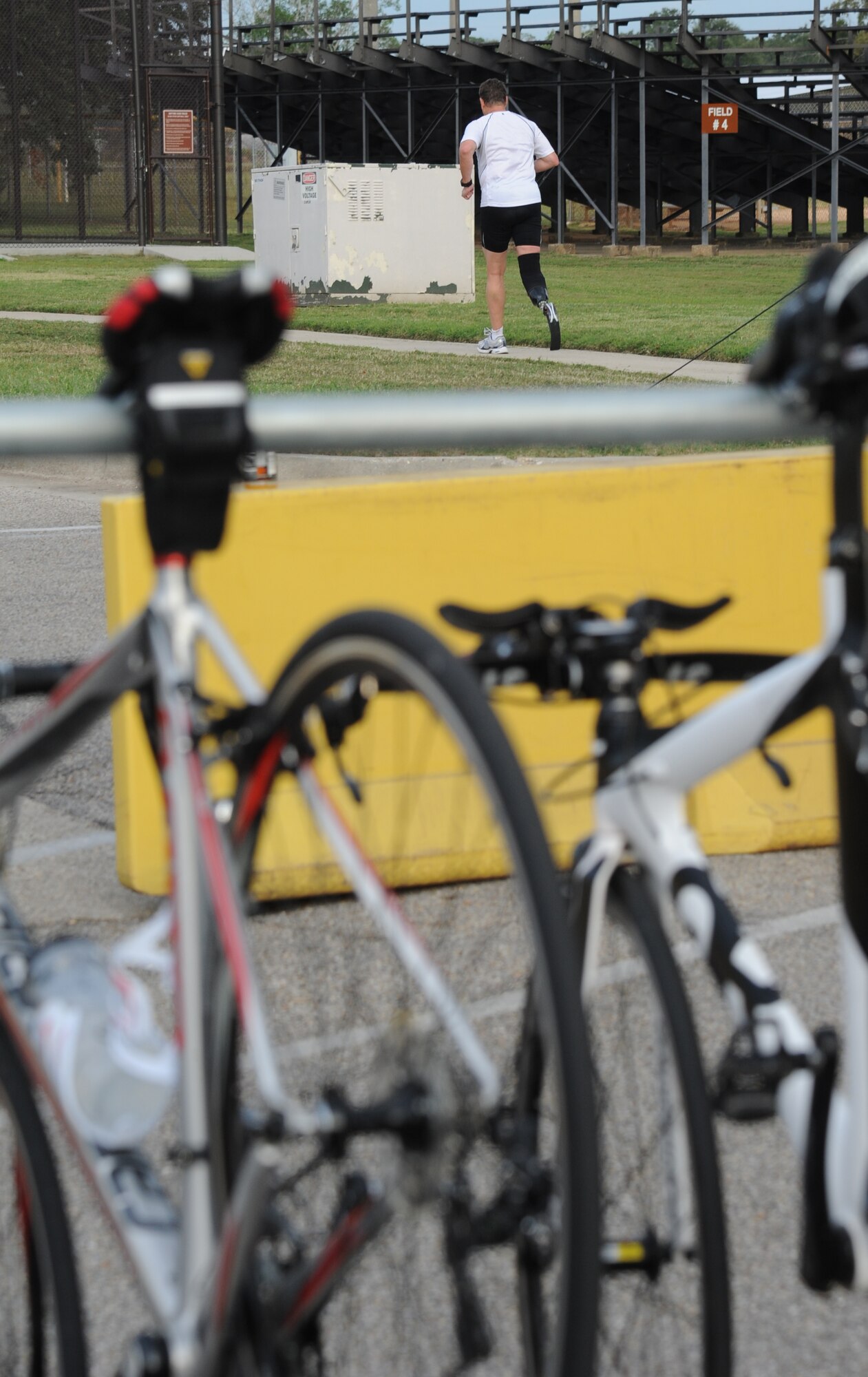 Retired Master Sgt. Tim Ozmun, begins the 2-mile run during Keesler’s mini-triathlon Sept. 26, 2014, at Keesler Air Force Base, Miss.  The event also included a 9-mile bike ride and a 200-yard swim.  (U.S. Air Force photo by Kemberly Groue)