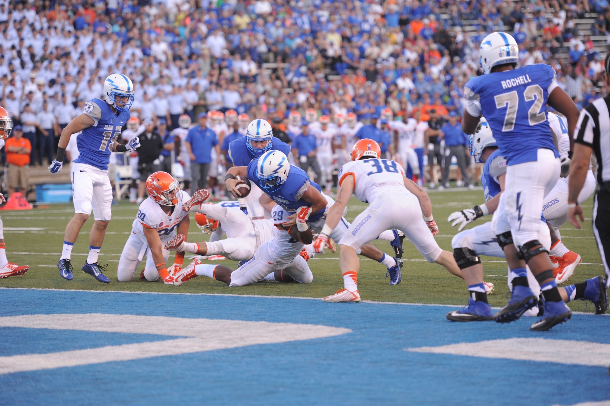 Falcons quarterback Kale Pearson stretches out to break the plane of the goal line for Air Force's second touchdown.  Pearson was Air Force's leading rusher, with 20 rushes for 127 yards and one touchdown.  He also passed for another 48 yards, one touchdown and a two-point conversion to give Air Force a 28-14 win over Boise State Sept. 27.  The win advances the Falcons record to 3-1 on the season and the Falcons will host the 2-3 Navy Midshipmen Oct. 4.