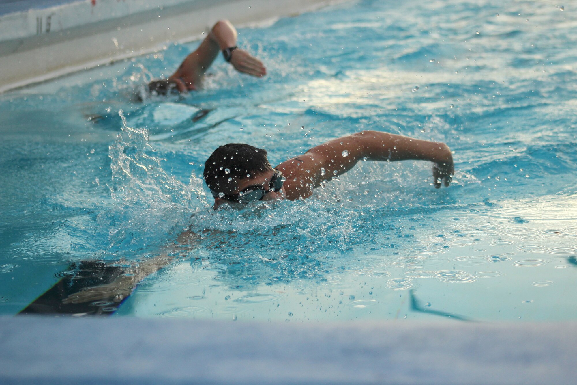 1st Lt. Nick Konishi, 81st Contracting Squadron, participates in the in the 200-yard swim during Keesler’s mini-triathlon Sept. 26, 2014, at Keesler Air Force Base, Miss.  The event also included a 9-mile bike ride and a 2-mile run.  (Courtesy photo by Natalie White)