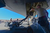 Airman Sidney Van Doorn, 28th Aircraft Maintenance Squadron weapons load crew journeyman, transports an inert GBU-34 bomb to a B-1 bomber during the Global Strike Challenge at Ellsworth Air Force Base, S.D., Sept. 26, 2014. The Global Strike Challenge is designed to improve combat capabilities through preparation, innovation, competition and teamwork. (U.S. Air Force photo by Senior Airman Zachary Hada/Released)