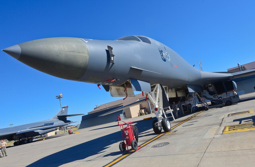 Airmen of the 28th Aircraft Maintenance Squadron are evaluated on bomb loading speed and technique during the Global Strike Challenge at Ellsworth Air Force Base, S.D., Sept. 26, 2014. The event is designed to improve the Air Force’s combat capabilities through competition, and recognize outstanding personnel and teams. (U.S. Air Force photo by Senior Airman Zachary Hada/Released)