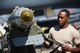 Airman 1st Class Antione Smith, 28th Aircraft Maintenance Squadron weapons load crew journeyman, prepares to secure an inert guided bomb unit onto a jammer during the Global Strike Challenge at Ellsworth Air Force Base, S.D., Sept. 26, 2014. Ellsworth Airmen routinely train on building and loading munitions quickly and accurately, ensuring the base is able to provide expeditionary combat power. (U.S. Air Force photo by Senior Airman Zachary Hada/Released)