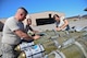 Airmen assigned to the 28th Aircraft Maintenance Squadron secure guided bomb units to a load trailer during the Global Strike Challenge at Ellsworth Air Force Base, S.D., Sept. 26, 2014. The event pits bomber, intercontinental ballistic missile and security forces teams from across the Air Force community against one another to improve combat capabilities and foster espirt de corps through competition and teamwork. (U.S. Air Force photo by Senior Airman Zachary Hada/Released)