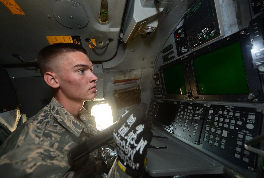 Senior Airman Justin Shields, 28th Aircraft Maintenance Squadron crew chief, inspects the central integrated test system control and display panels in a B-1 bomber during the Global Strike Challenge at Ellsworth Air Force Base, S.D., Sept. 26, 2014. The 28th Bomb Wing is one of seven bomb wings competing for the title of the Air Force’s best bomber wing. (U.S. Air Force photo by Senior Airman Zachary Hada/Released)