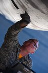 Tech. Sgt. Ryan Walker, 28th Aircraft Maintenance Squadron crew chief, inspects a B-1 bomber during the Global Strike Challenge at Ellsworth Air Force Base, S.D., Sept. 26, 2014. Global Strike Challenge is the world’s premier competition for bomber crews, Intercontinental Ballistic Missile crews and security forces, and includes units from Air Combat Command, Air Force Global Strike Command, Air Force Reserve Command and the Air National Guard. (U.S. Air Force photo by Senior Airman Zachary Hada/Released)