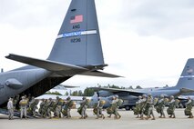 U.S. Army soldiers from the 82nd Airborne Division board a C-130H Hercules aircraft assigned to the Kentucky Air National Guard’s 123rd Airlift Wing at Gardermoen Military Air Station in Oslo, Norway, on Sept. 23, 2014. Airmen from Kentucky unit provided airlift support to the 82nd during Operation Noble Ledger. (U.S. Air National Guard photo by Master Sgt. Charles Delano)