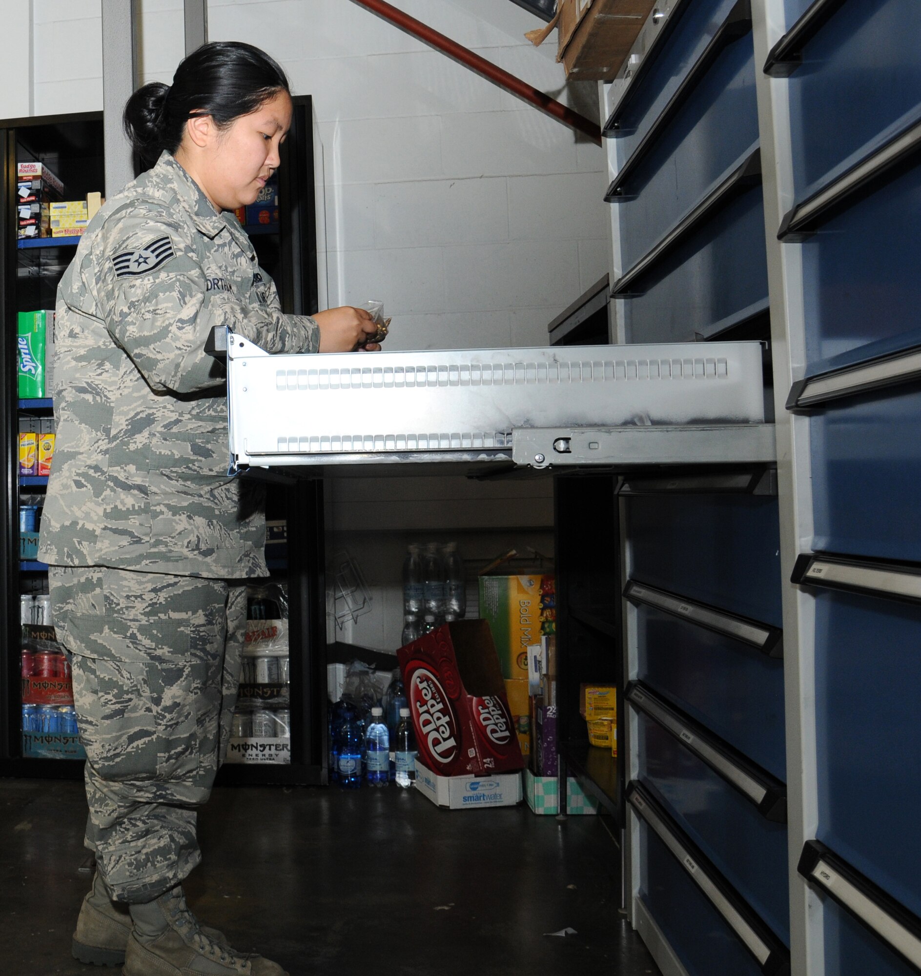 U.S. Air Force Staff Sgt. Erica Northam, 100th Aircraft Maintenance Squadron debrief and supply focal point technician from Juneau, Alaska, inventories bench stock Sept. 12, 2014, on RAF Mildenhall, England. The section is the turn-in point for the 100th Logistics Readiness Squadron supply section and they keep track of where parts are that aren’t needed on the aircraft at that time. (U.S. Air Force photo/Gina Randall/Released)