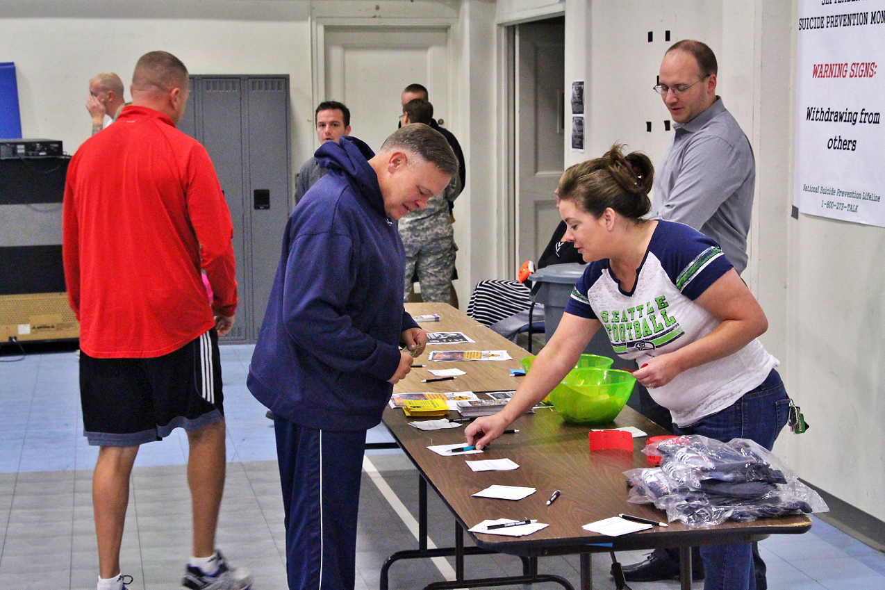 Army Maj. Gen. Bret D. Daugherty, center, adjutant general for the