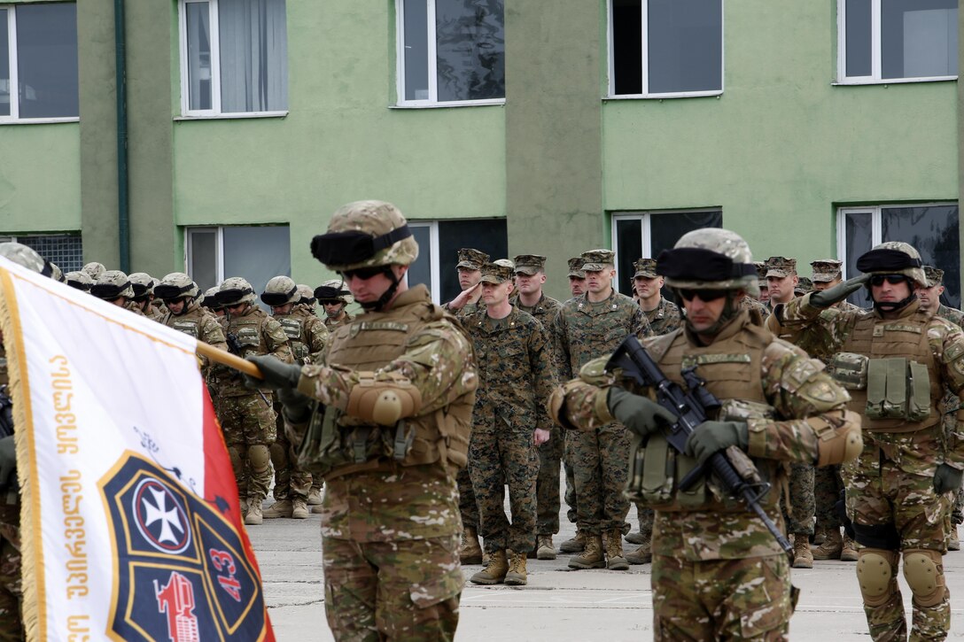 The Georgian 43rd Light Infantry Battalion are the feature of the departure ceremony on March 24 at Vaziani Training Area, Georgia, as they, along with U.S. Marine advisors, deploy to contribute to NATO’s Resolute Support in Afghanistan. The U.S. Marines and Georgian soldiers have trained together since October as part of the Georgia Deployment Program.