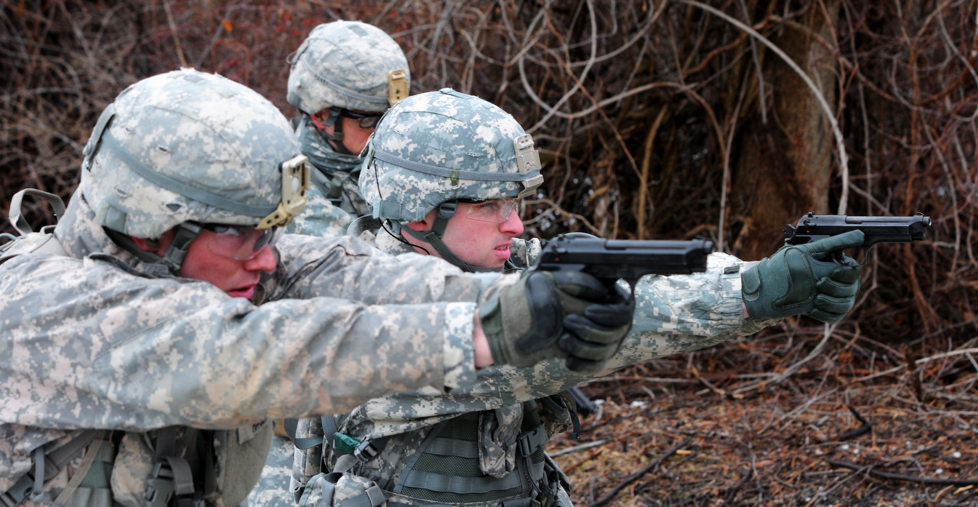 Soldiers participating in the New York Army National Guard's annual Best Warrior competition engage targets with the  M9 pistol March 27, 2015, at Camp Smith Training Site, near Peekskill, New York. The pistol was added to the competition so Soldiers could earn the German Armed Forces Proficiency Badge, along with competing for Best Warrior. The pistol event requires the firers to shoot two targets each at the prone, kneeling and standing positions. 