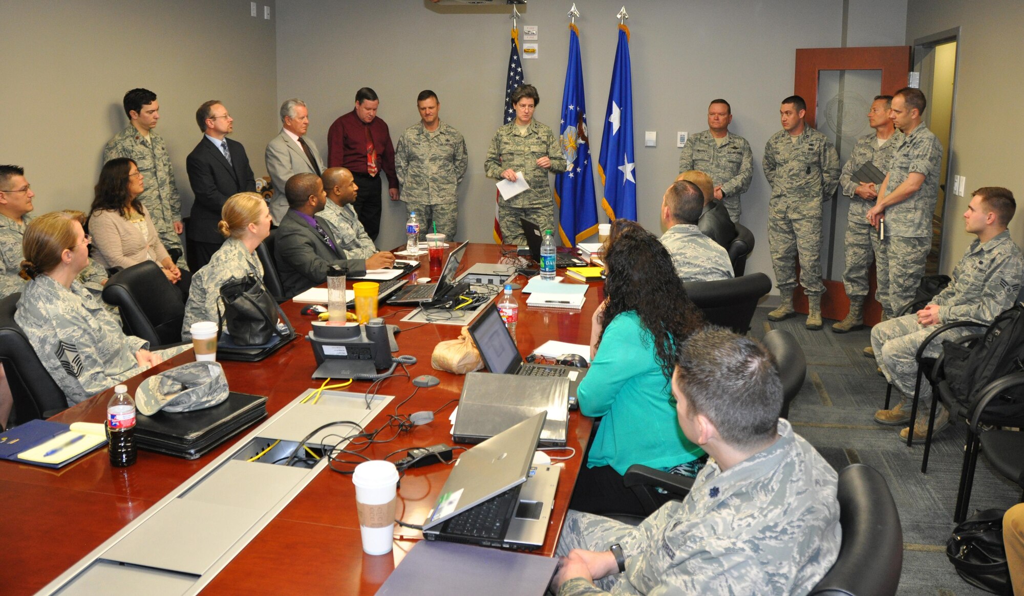 Maj. Gen. Peggy Poore, Air Force Personnel Center commander, visited the Air Reserve Personnel Center where she was greeted by Brig. Gen. Samuel "Bo" Mahaney, ARPC commander, March 16, 2015, on Buckley Air Force Base, Colo. Poore had breakfast with the Airmen, coined some members from the center and was given a tour of the headquarters building. (U.S. Air Force photo/Tech. Sgt. Rob Hazelett)