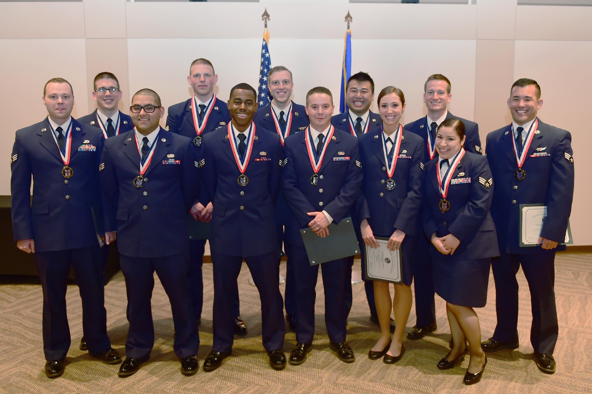 Buckley Airman Leadership School Class 15-C stands together after their graduation March 26, 2015, at the Leadership Development Center on Buckley Air Force Base, Colo. Senior Airman Maurice Brown, Air Reserve Personnel Center DD Form 214 technician, was among the graduates. This graduation represents an important part of the enlisted force professional military education, teaching valuable skills required for supervisors. (U.S. Air Force photo by Airman 1st Class Luke Nowakowski/Released)