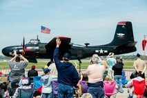 Crowds wave as the Lady Liberty aircraft passes by during the Keesler Air Force Bases, Mississippi 2015 Air Show/Open House, March 28, 2015. The event included the U.S. Air Force Thunderbirds and Army Golden Knights along with many other performers, static displays and vendors. Approximately 155,000 people were in attendance for the two-day show. (U.S. Air Force photo by Marie Floyd)