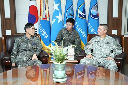 OSAN AIR BASE, Republic of Korea (Mar. 27, 2015) - Brig. Gen. Eric Sanchez, Commander, 94th Army Air and Missile Defense Command, sits with Maj. Gen. Kim, Commander, Republic of Korea Air Force, Air Defense Missile Command, while discussing IAMD opportunities during exercise Key Resolve 2015.

