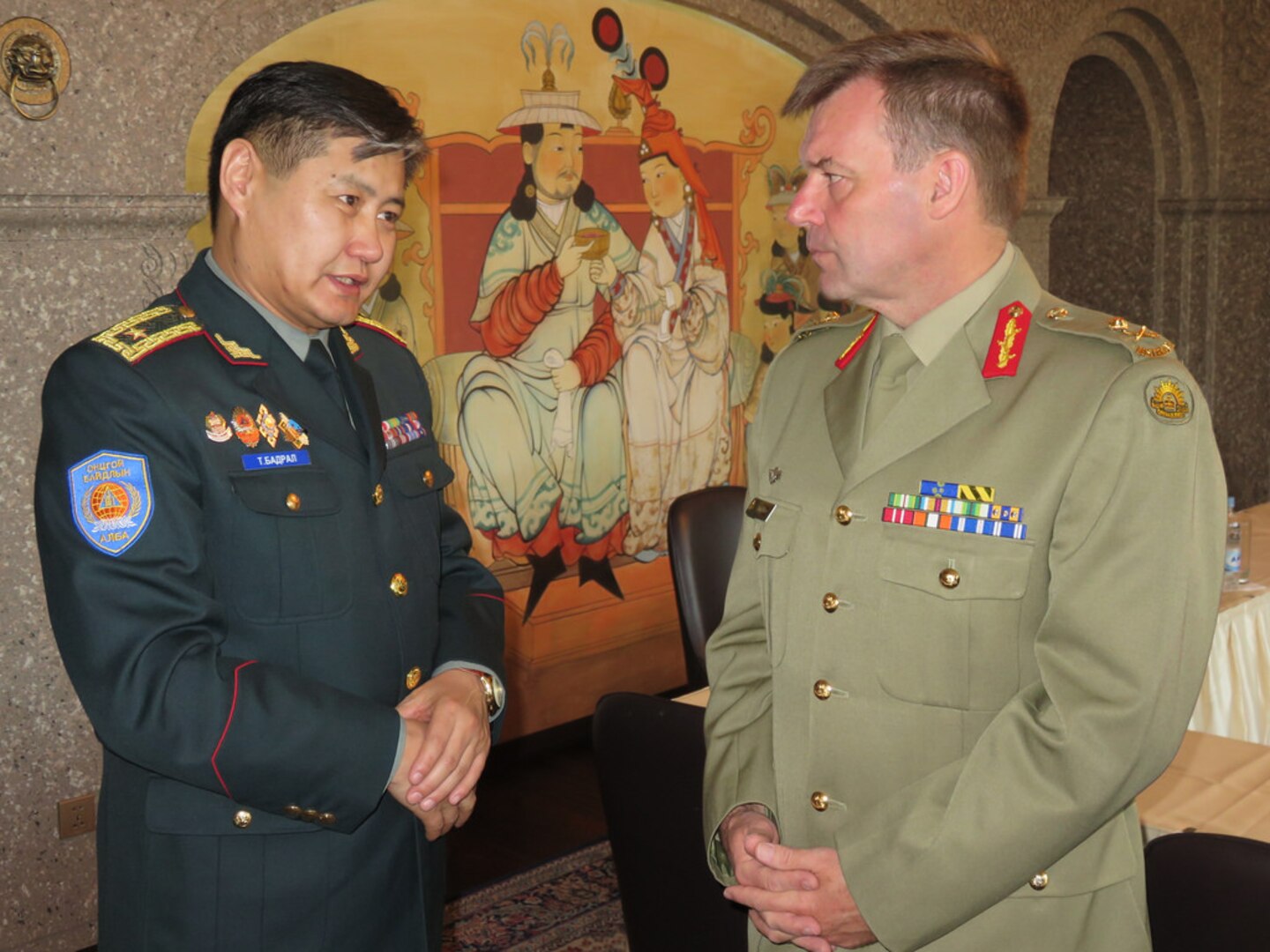 ULAANBAATAR, Mongolia (Mar. 24, 2015) - U.S. Army Pacific Deputy Commanding General (Operations), Maj. Gen. Gregory Bilton and Chief of the National Emergency Management Agency, Brig. Gen. Tuvshin Badral discuss the opening of Gobi Wolf. Gobi Wolf 2015 is a civil-military disaster preparedness and response initiative that focuses on regional readiness in response to natural and man-made disasters. 