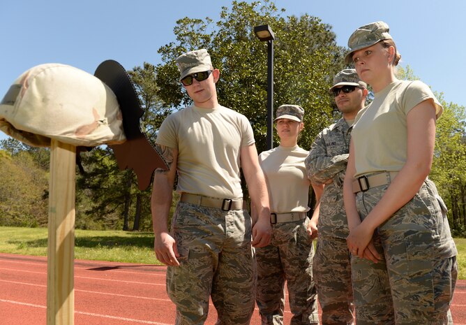 More than a dozen Team Charleston members participated in a sexual assault 
awareness silent walk March 31, 2015 at the Joint Base Charleston Air Base track. 
Many members stopped to read the helmets with sexual assault case descriptions 
on them. The walk was one of the last events for March's Sexual Assault 
Prevention and Response program. The 628th Air Base Wing declared the month of 
April 2015 as Sexual Assault Awareness Month for Team Charleston and will hold 
numerous events throughout April. (U.S. Air Force photo by Senior Airman 
Daniel Hughes)
