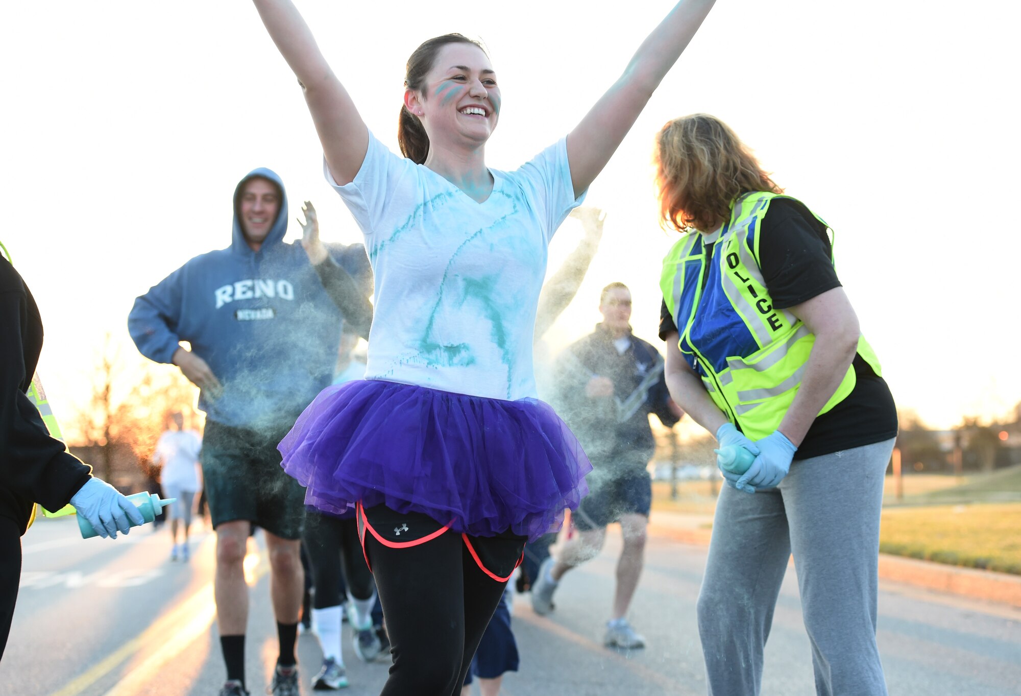Senior Airman Alana Dadlez, 11th Comptrollers Squadron permanent change of station team lead, runs during the Run with Color 5k on Joint Base Andrews, Md., April 1, 2015. The JBA Sexual Assault Prevention and Response program hosted the 5K to kick-off Sexual Assault Awareness Month. (U.S. Air Force photo/ Senior Airman Nesha Humes)