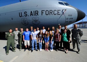 Members of Team McConnell pose with Greg Rasmussen, second from right, Andover School District superintendent, and members of his Student Advisory Team pose with members of Team McConnell, March 31, 2015, at McConnell Air Force Base, Kan. The group discussed the base with the 22nd Air Refueling Wing commander and toured different parts of the base, including a static display of KC-135 Stratotanker. (U.S. Air Force photo by Senior Airman Victor J. Caputo)