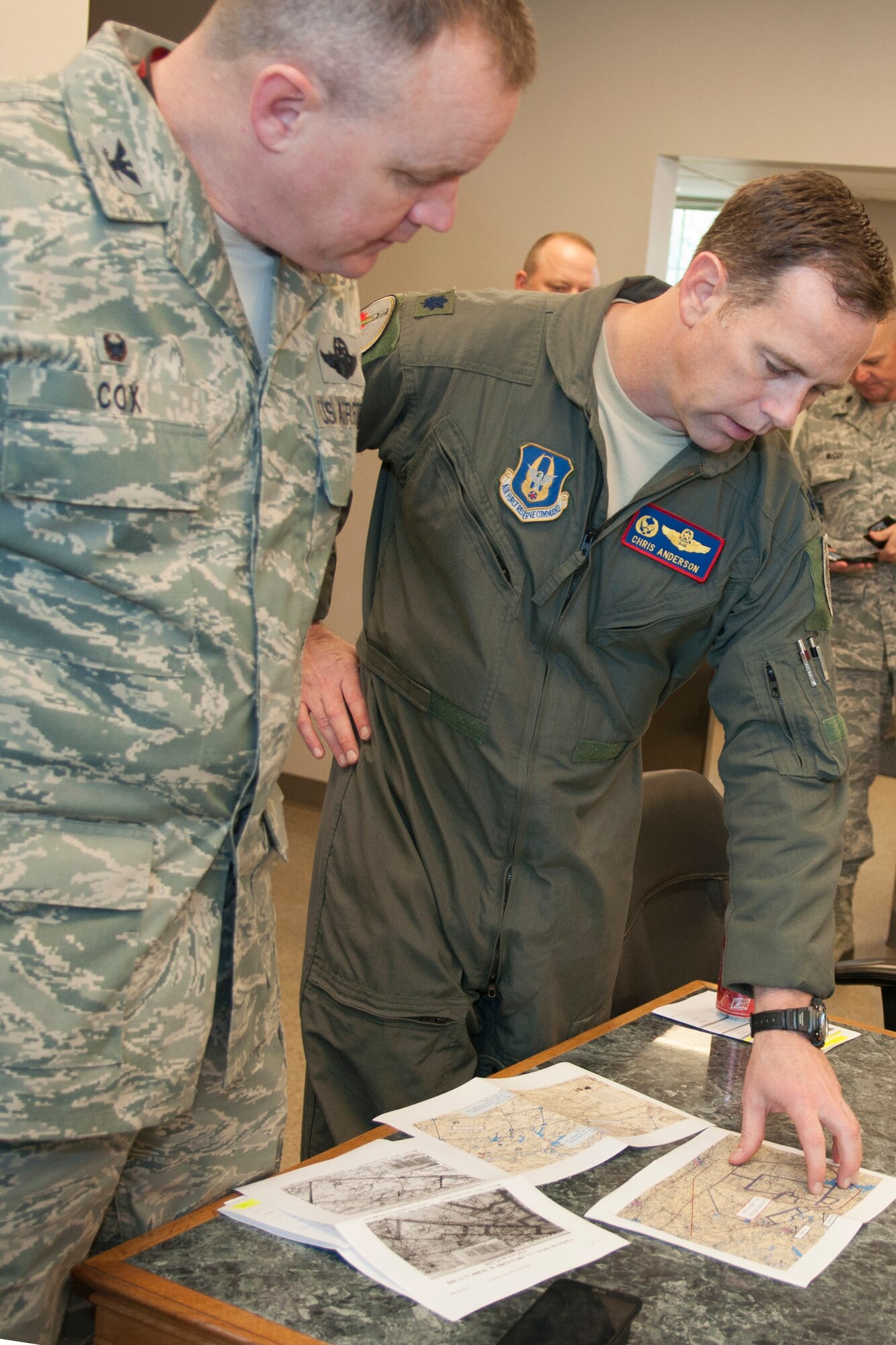U.S. Air Force 307th Operations Support Squadron Commander, Lt. Colonel Christopher Anderson, briefs the 307th Bomb Wing Commander, Colonel Bruce Cox, about the airspace of the Claiborne Range near Alexandria, La., March 25, 2015. Claiborne Range provides aircrews the opportunity to receive real time Electronic Countermeasure training and also acts as a conventional bombing, exercise and target range for all branches of the military. (U.S. Air Force photo by Master Sgt. Dachelle Melville/Released)