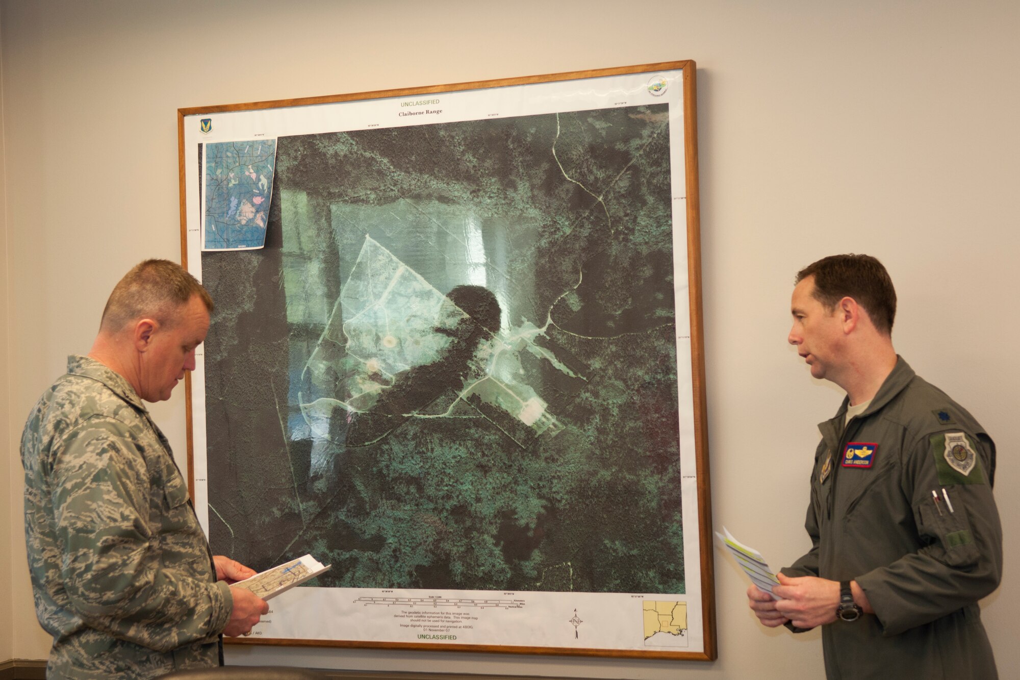 U.S. Air Force Lt. Colonel Christopher Anderson, commander of the 307th Operations Support Squadron, briefs the 307th Bomb Wing Commander, Colonel Bruce Cox, about the boundaries of Claiborne Range near Alexandria, La., March 25, 2015. Claiborne Range provides aircrews the opportunity to receive real time Electronic Countermeasure Training and also acts as a conventional bombing, exercise and target range for all branches of the military. (U.S. Air Force photo by Master Sgt. Dachelle Melville/Released)