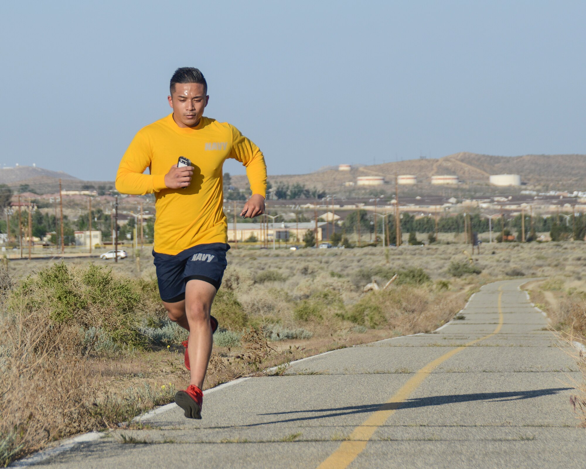 Petty Officer 2nd Class Jener Delossantos, was the first to finish the run in 25:20. (U.S. Air Force photo by Rebecca Amber)