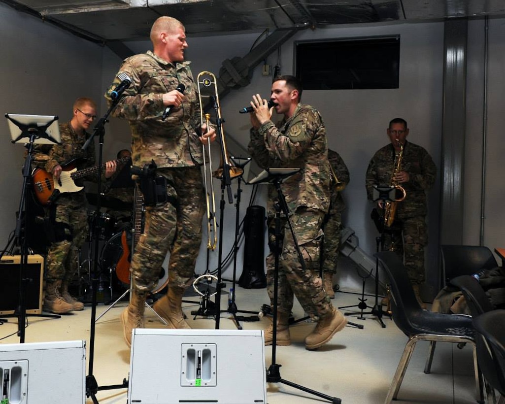 Nighthawk's musical director, Technical Sgt. Kevin Cerovich, and male
vocalist, Technical Sgt. Daniel Anderson, entertain fellow service members
with an energetic show. (U.S. Air Force photo/released)