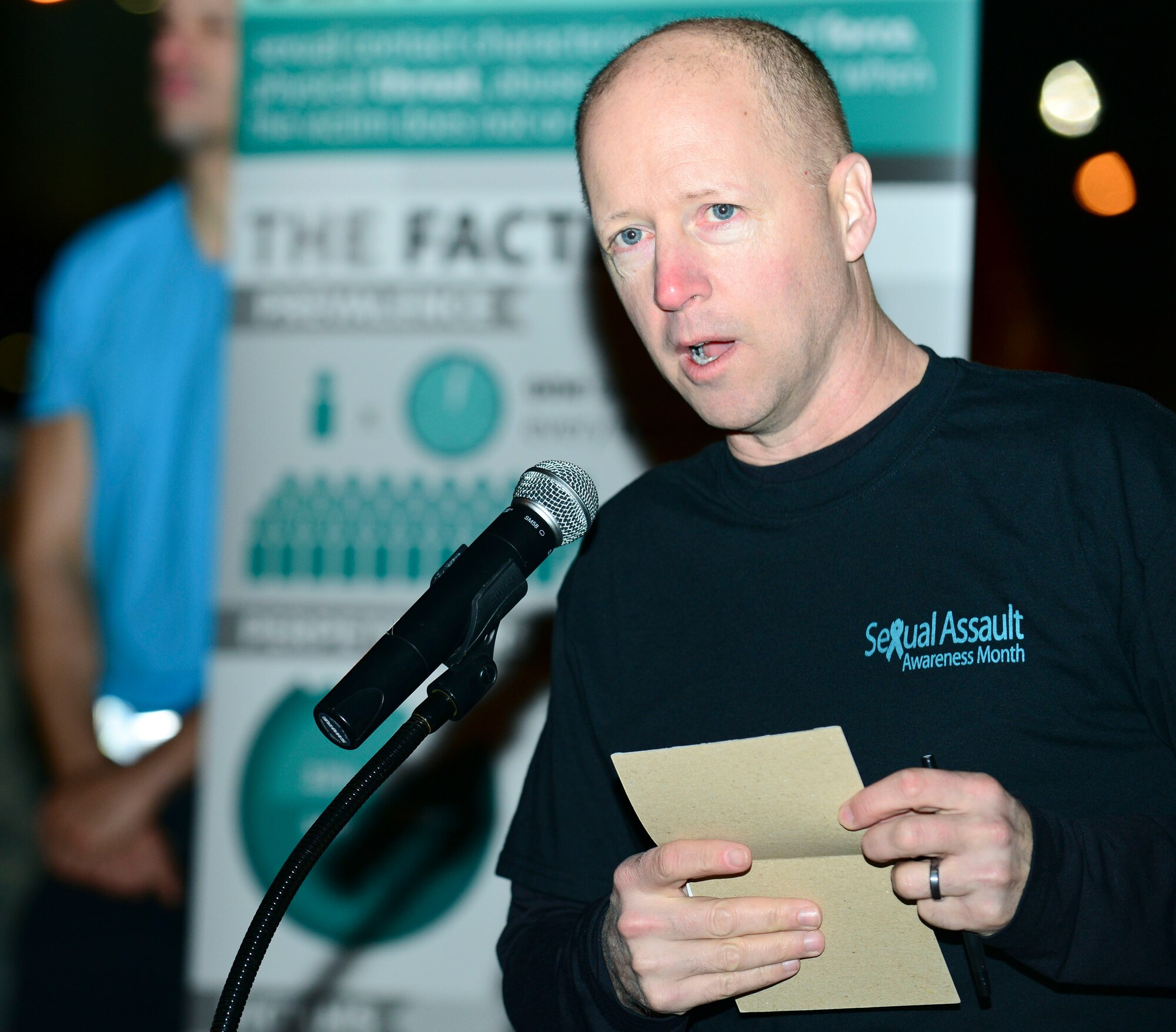 U.S. Army Col. Randal Nelson, 7th Transportation Brigade (Expeditionary) commander, speaks before the Sexual Assault Awareness and Prevention Month 5K run at Fort Eustis, Va., April 1, 2015. During his speech, Nelson spoke of the importance of preventing sexual assault. (U.S. Air Force photo by Senior Airman Kimberly Nagle/Released) 
