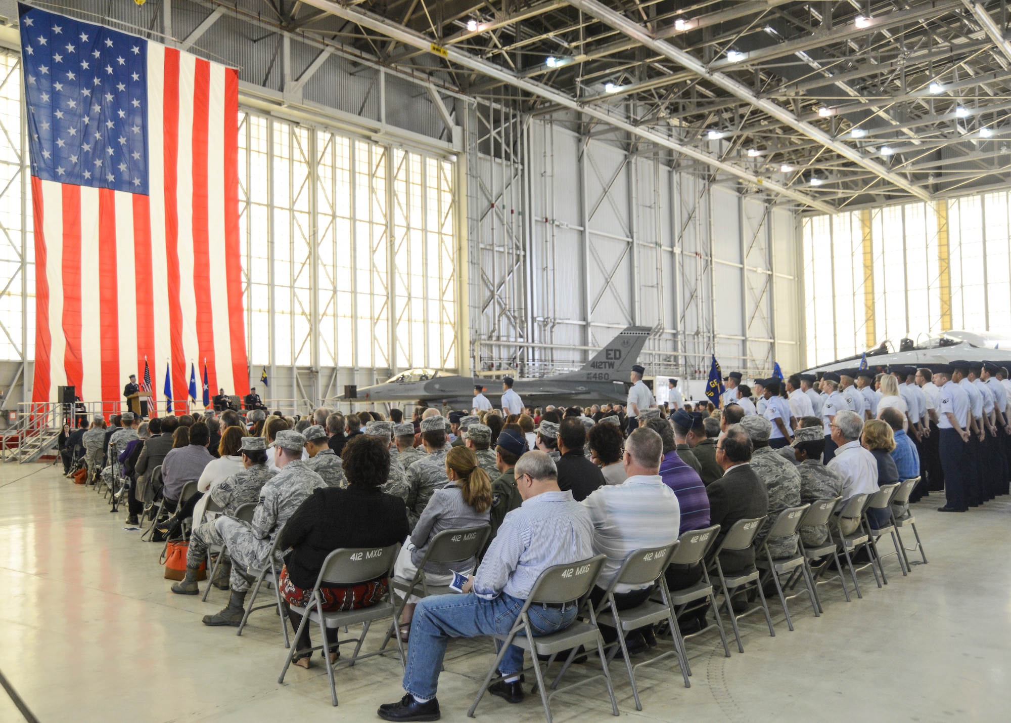 Brig. Gen. Carl Schaefer, addresses the 412th Test Wing for the first time as commander during a change of command ceremony in Hangar 1600, March 31. The ceremony was attended by members of the Edwards AFB workforce, local community leaders, and friends and families of Schaefer and outgoing commander, Brig. Gen. Michael T. Brewer. (U.S. Air Force photo by Rebecca Amber)