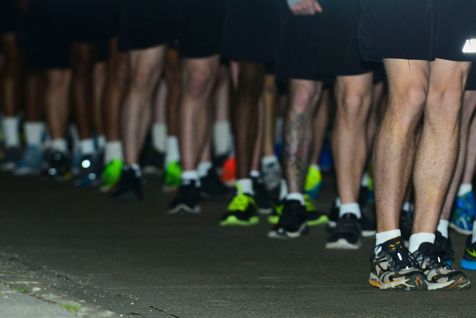 Runners line up to participate in the Sexual Assault Awareness and Prevention Month 5K kick-off event at Fort Eustis, Va., April 1, 2015. The 5K was one of the multiple SAAPM activities that are scheduled throughout the month of April. (U.S. Air Force photo by Senior Airman Kimberly Nagle/Released)