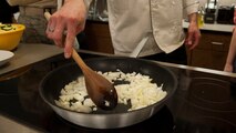 Jeffrey Moore, 436th Force Support Squadron, stirs diced onions March 31, 2015, at Dover Air Force Base, Del. Moore acted as a guest chef for this session. (U.S. Air Force photo/Airman 1st Class Zachary Cacicia)