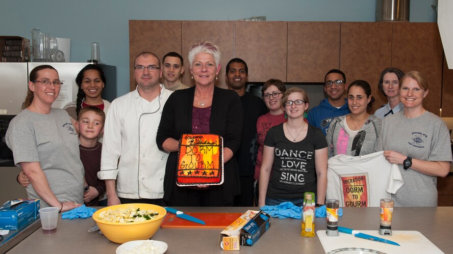 “Dorm to Gourm” class participants pose for a group shotMarch 31, 2015, at Dover Air Force Base, Del. This session was the one year anniversary of the “Dorm to Gourm” Leadership Pathways class. (U.S. Air Force photo/Airman 1st Class Zachary Cacicia)