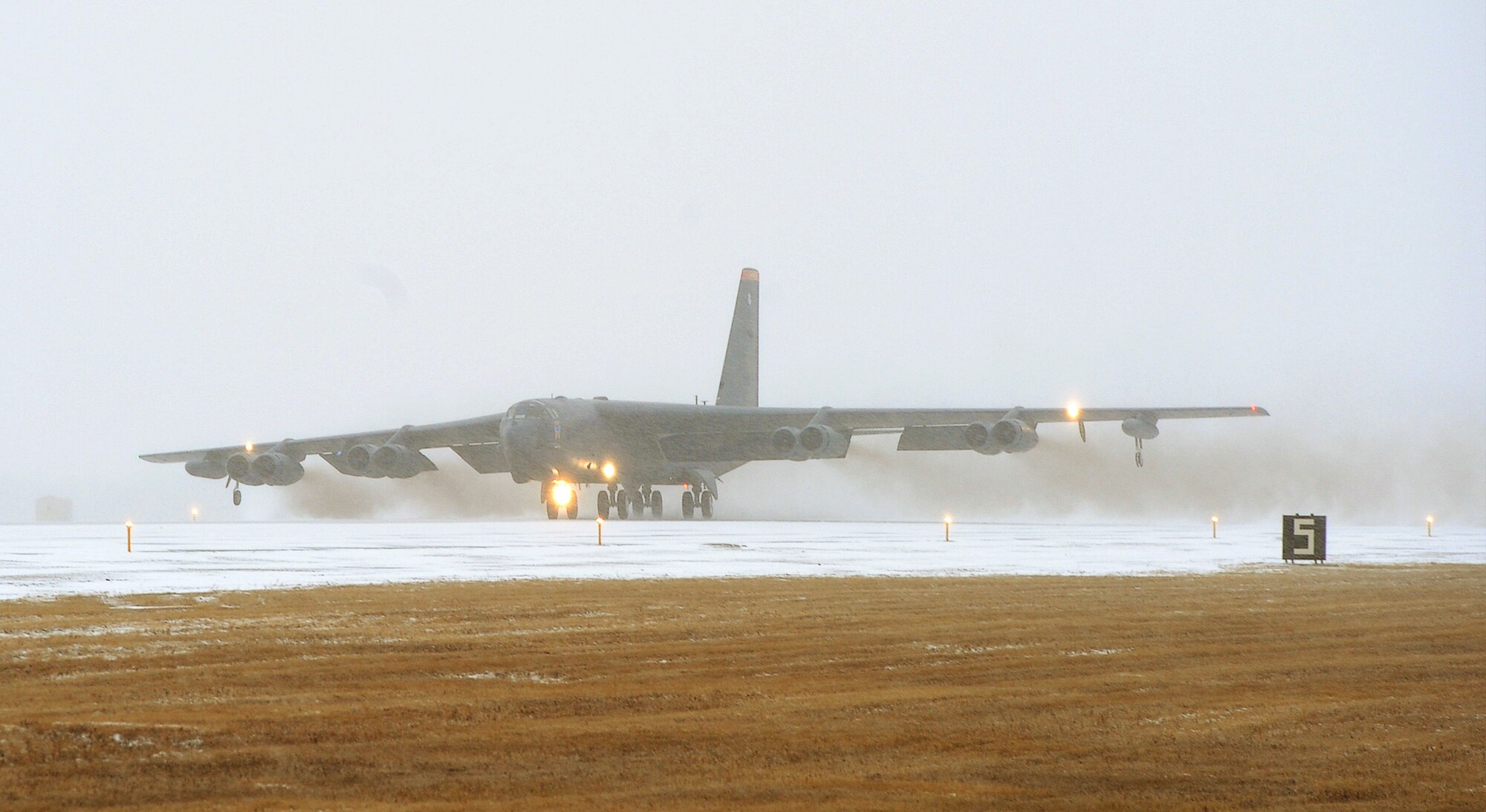 A B-52H Stratofortress takes off during the Prairie Vigilance exercise on Minot Air Force Base, N.D., March 27, 2015. Prairie Vigilance is a multi-wing exercise designed to demonstrate safe, secure, reliable nuclear weapons standards and procedures. (U.S. Air Force photo/Senior Airman Kristoffer Kaubisch)