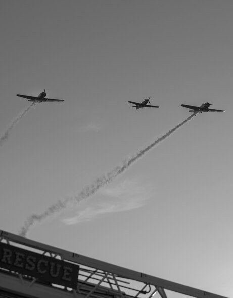 Members of the Destin community perform a fly over honoring all Veterans during the Black Hawk UH-60 memorial service March 31 at Destin Executive Airport, Fla.  Approximately 200 from the Destin community held a candlelight memorial service honoring the fallen servicemen in the Black Hawk UH_60 crash in Santa Rosa Sound on March 11. (U.S. Air Force photo/ Tech. Sgt. Jasmin Taylor)