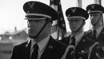 The Eglin Air Force Base Honor Guard prepares to post the colors during the Black Hawk UH-60 memorial service to remember the fallen servicemen March 31 at Destin Executive Airport, Fla.  Approximately 200 from the Destin community held a candlelight memorial service honoring the fallen servicemen in the Black Hawk UH-60 crash in Santa Rosa Sound on March 11.  (U.S. Air Force photo/Tech. Sgt. Jasmin Taylor)